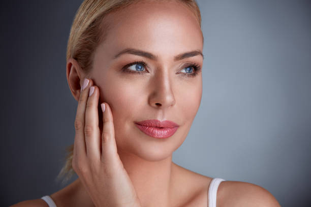 istock Pretty middle age woman with perfect skin 664431876