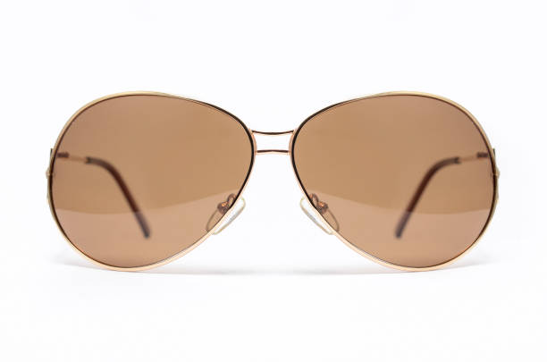 istock Sunglasses in an iron frame with brown glass isolated on white 664435650
