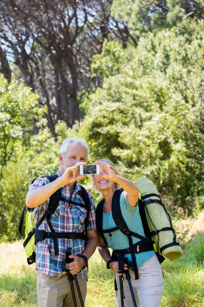 istock senior couple taking a picture 664435952