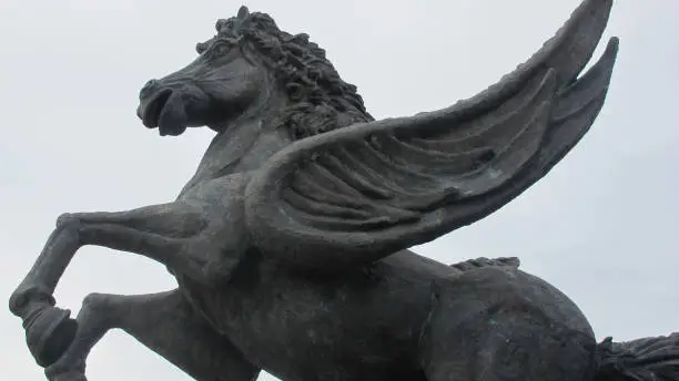 Photo of Low angle closeup of a Pegasus statue