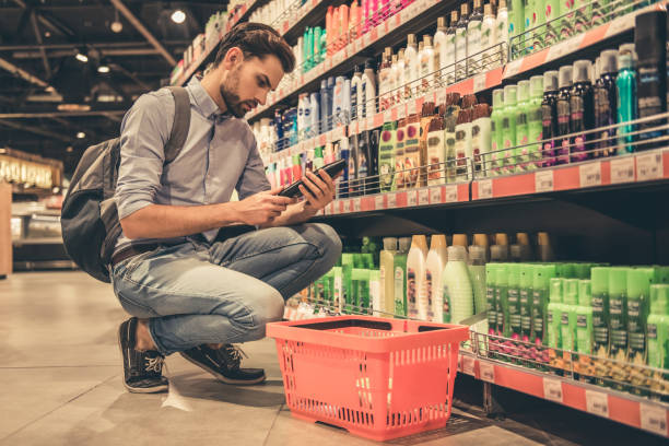 Man at the supermarket stock photo