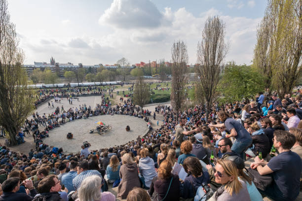 Berlin, Germany - april 02, 2017: People at Mauerpark watching the sundays Karaoke show in Berlin, Germany.