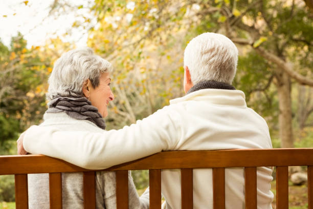 istock Senior couple in the park 664451874