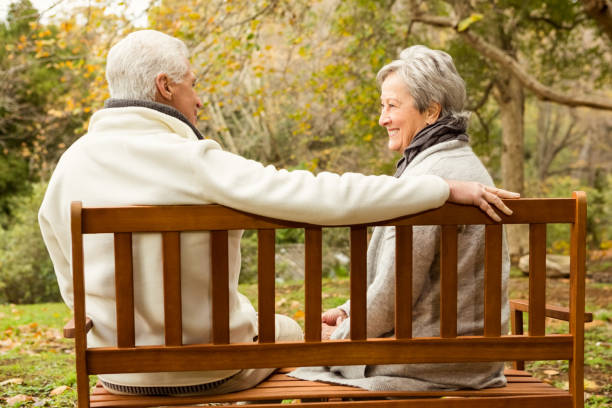 istock Senior couple in the park 664452050