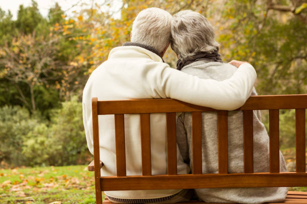istock Senior couple in the park 664452114