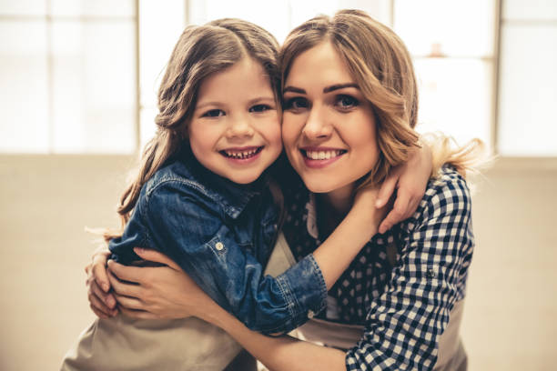 istock Mom and daughter baking 664454242