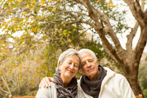 istock Senior couple in the park 664454772