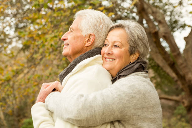 istock Senior couple in the park 664455298