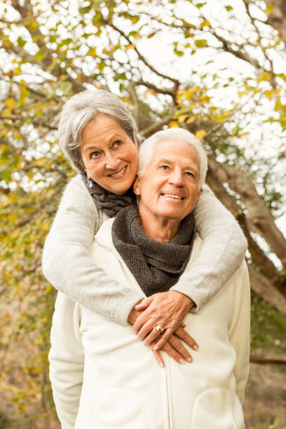 istock Senior couple in the park 664455892
