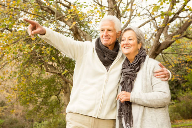 istock Senior couple in the park 664456048