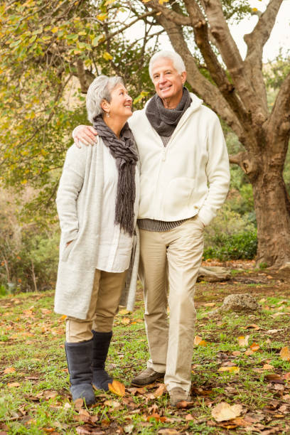 istock Senior couple in the park 664459100