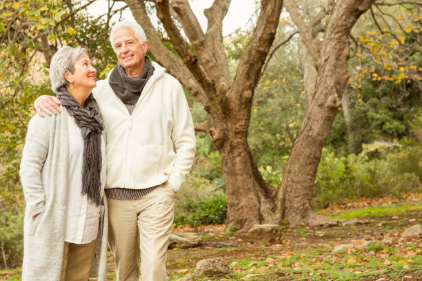 istock Senior couple in the park 664459140