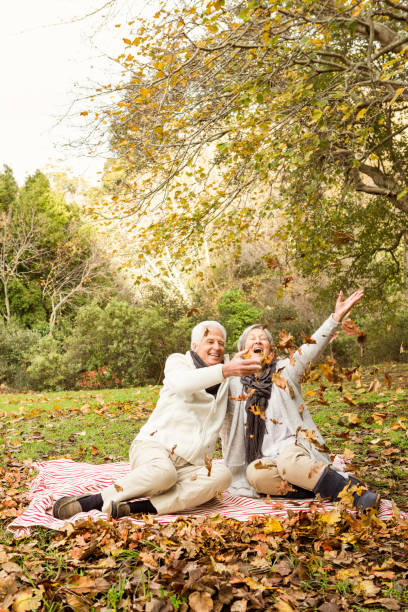 istock Senior couple in the park 664462072