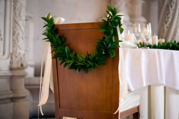 istock Chair for bride decorated with a wedding wreath 664465254