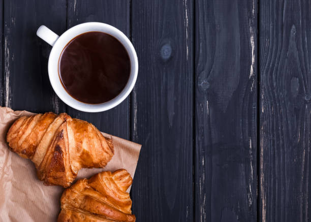 istock Breakfast on the black wooden table. 664470646