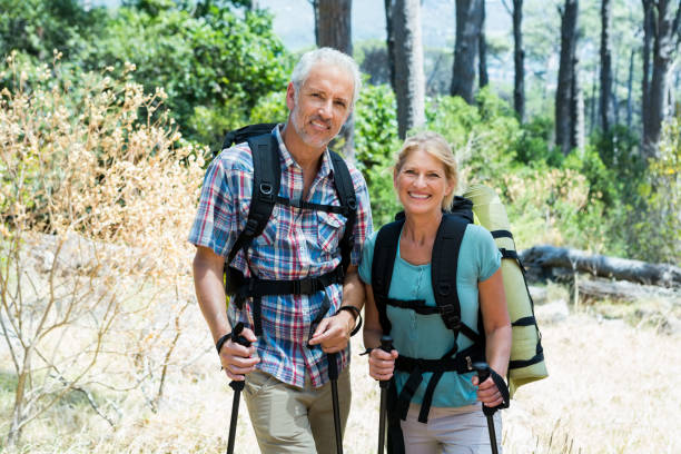 istock Senior couple standing with their stick 664483404