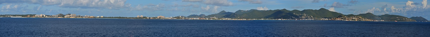 The entire southwestern shore of Saint Martin, Saint Maarten, island in one shot as a ship sails into the Caribbean. Most of the place names are included in this image, but none of the French portion of the island