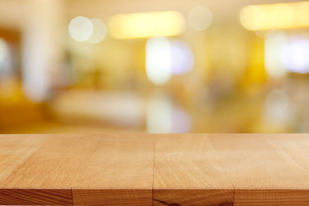 istock Wood table on blur background for advertising display 664490680