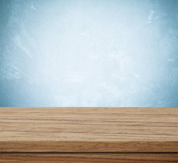 istock Empty wooden table over grunge cement wall, vintage, background, template, product display montage 664497392