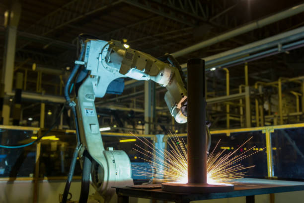 istock Industrial robot is test run program welding in factory 664498338