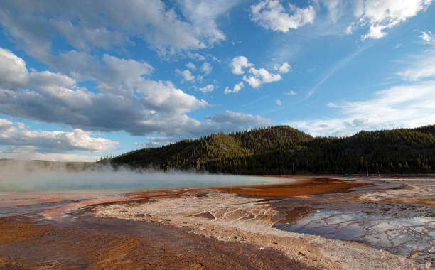 istock Grand Prismatic Spring under sunset cloudscape in the Midway Geyser Basin in Yellowstone National Park in Wyoming USA 664504990