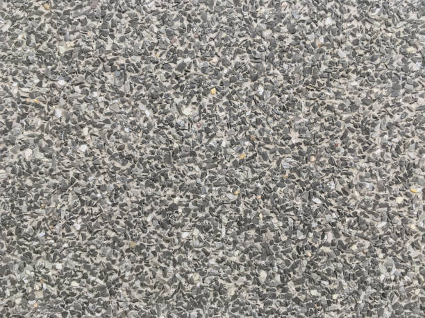 istock Closeup surface abstract stone pattern at the black stone floor textured background 664506104