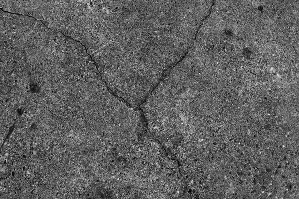 istock Crack concrete road texture close up background. 664514286