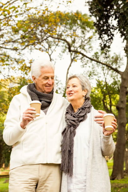 istock Senior couple in the park 664518374
