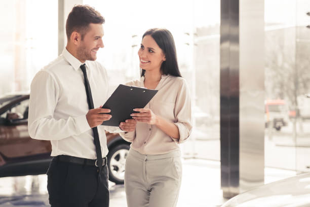 istock Visiting car dealership 664520900