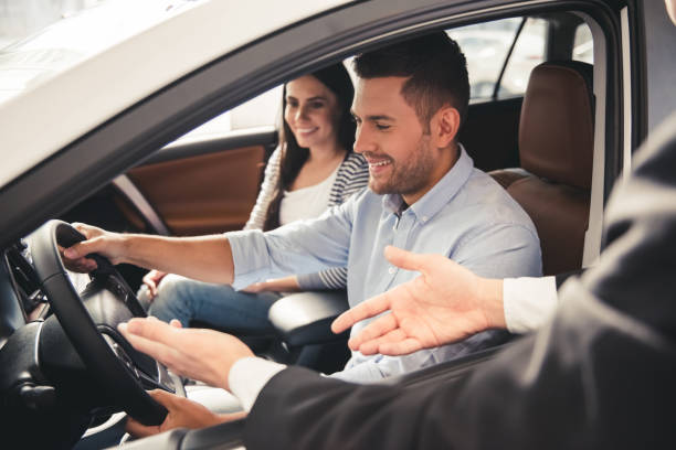 istock Visiting car dealership 664522350