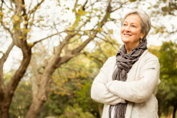 istock Senior woman in the park 664522466