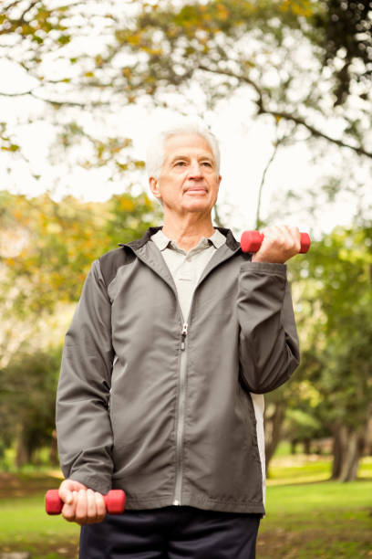 istock Senior man working out in park 664529112