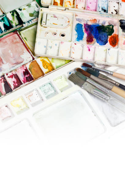 istock Artists brushes and watercolor paints. 664529118