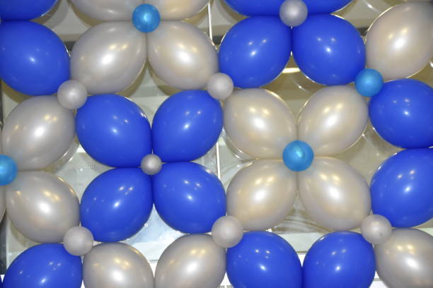 istock Arrangement of blue and white balloons 664529792