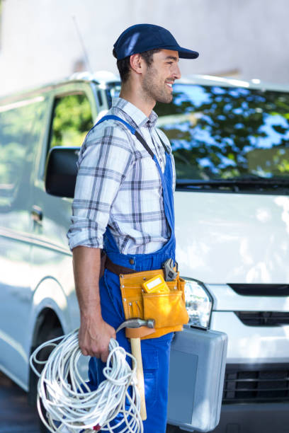 istock Side view of happy carpenter with toolbox 664529834