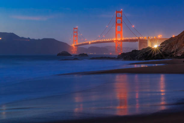 istock Golden Gate Bridge in San Francisco from Baker Beach at sunset 664532356