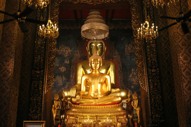 istock Beautiful of golden Buddha statue . 664533486