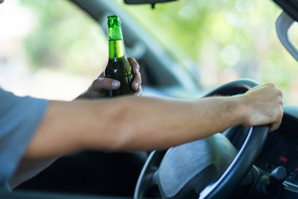 istock Cropped hands of man with alcohol 664533682