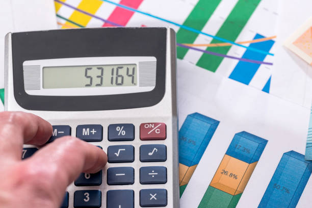 istock business graph with calculator. business concept. close up. 664534156