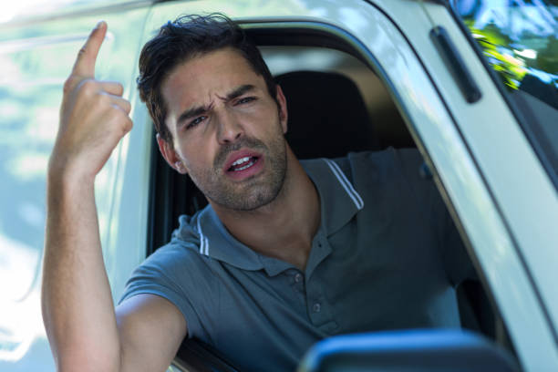istock Portrait of irritated young man pointing 664534722