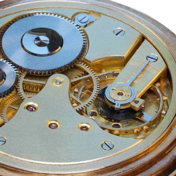istock Old watch's mechanism, clockwork, gold with rubies 664538346