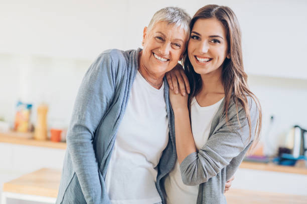 piękno i kobiecość przez pokolenia - aging process women human face daughter zdjęcia i obrazy z banku zdjęć