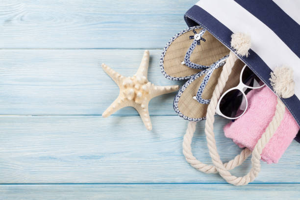 istock Beach accessories on wooden background 664552030
