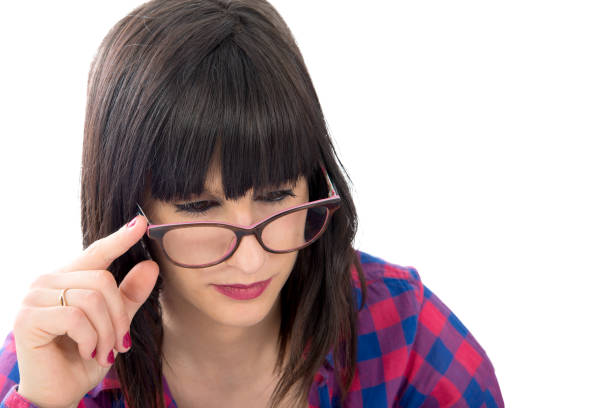 istock Young brunette girl with a check shirt 664555980