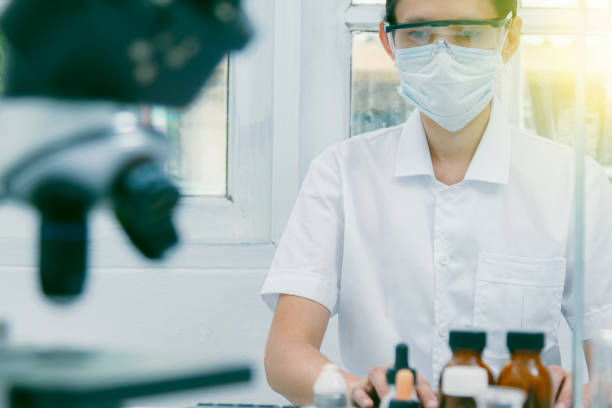 istock The scientist test in lab or science research,science concept.Scientist work in process at laboratory,Science experiments and selective focus,Science laboratory test tubes. 664556470