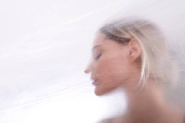 istock woman behind foil 664560166