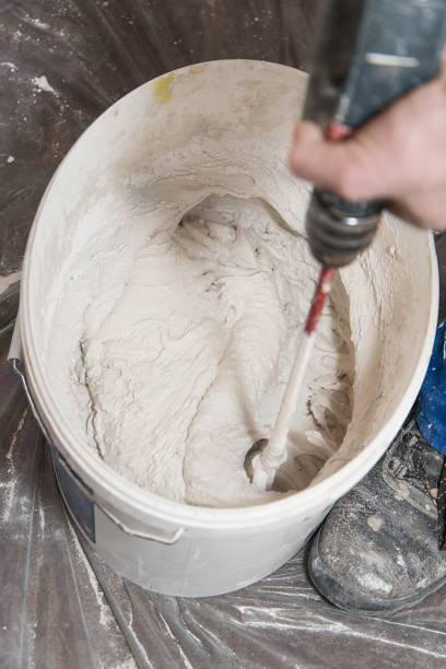 istock Paint mixer and bucket 664560934