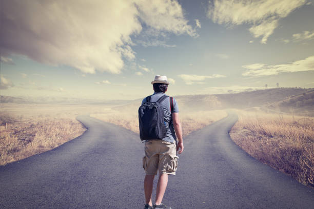 istock Concept of choice with crossroads spliting in two ways 664564090
