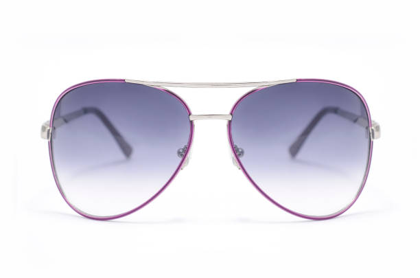 istock Sunglasses in purple iron frame isolated on white 664565564