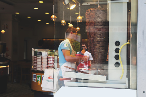 Man working in kebab shop, Taksim, Istanbul, Turkey. The photo was taken on November 07, 2011. 